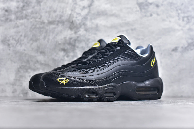 Black and Gold Athletic Sneakers Outdoor Display