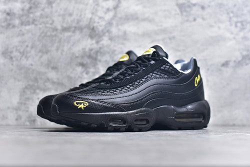 Black and Gold Athletic Sneakers Outdoor Display