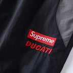 Supreme Racing Logo Track Pants