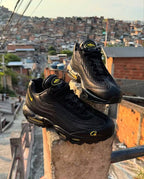 Black and Gold Athletic Sneakers Outdoor Display