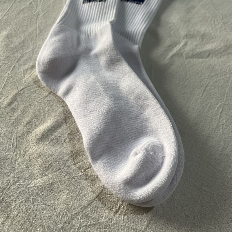 White Crew Socks with Navy Logo Patch