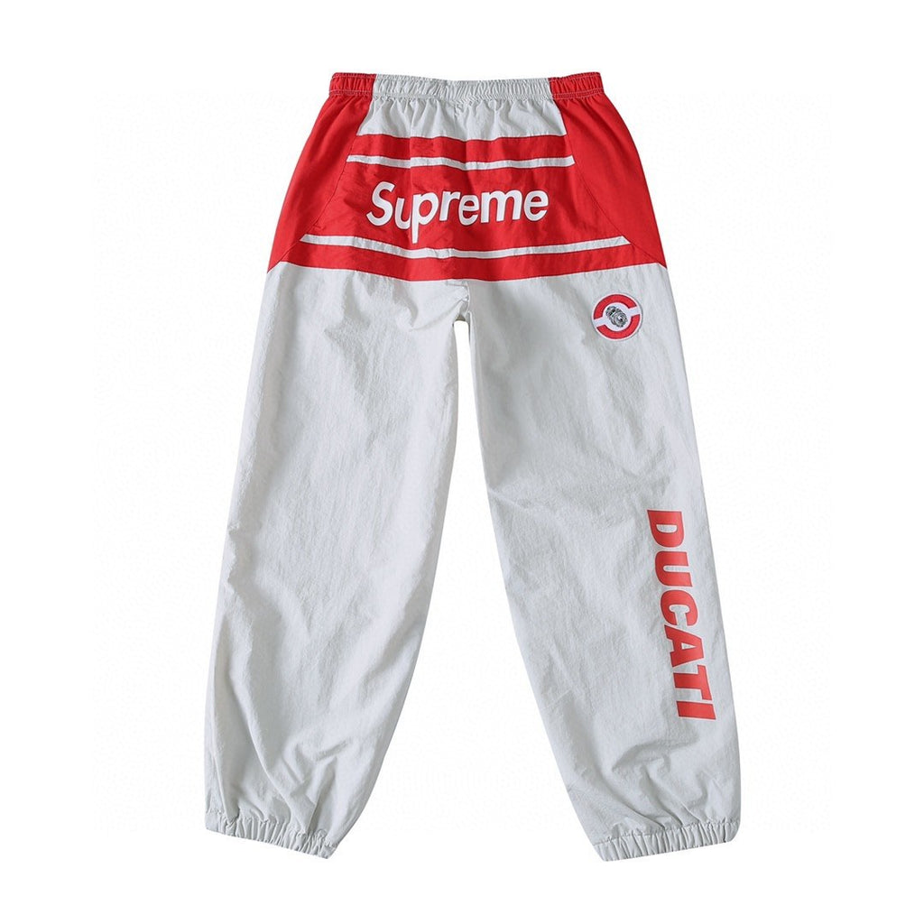 Supreme Racing Logo Track Pants