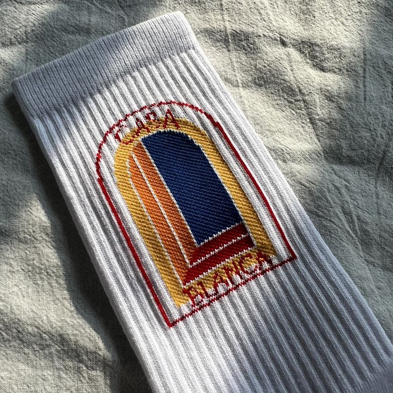 White Crew Socks with Arcteryxh Graphic