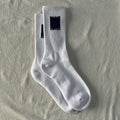 White Crew Socks with Navy Logo Patch