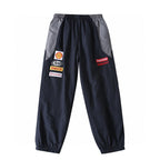 Supreme Racing Logo Track Pants