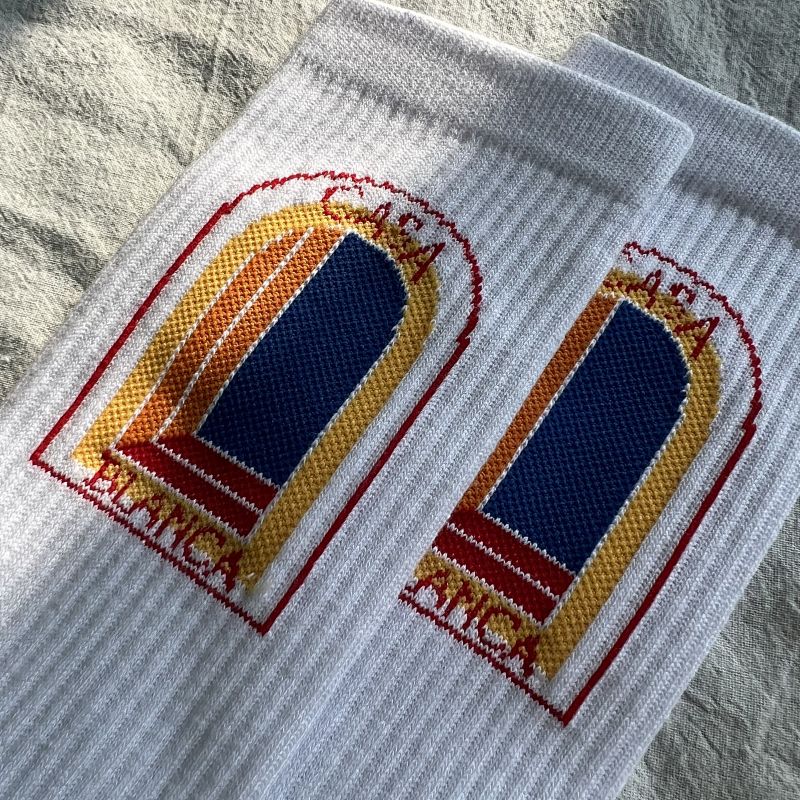 White Crew Socks with Arcteryxh Graphic