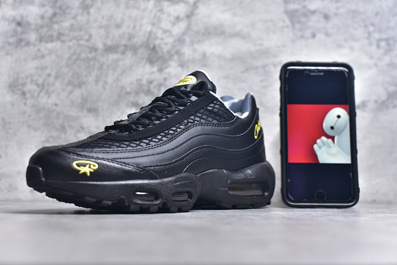 Black and Gold Athletic Sneakers Outdoor Display