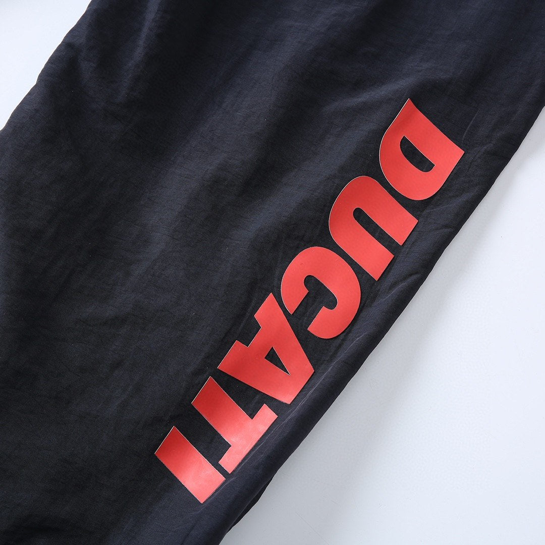 Supreme Racing Logo Track Pants