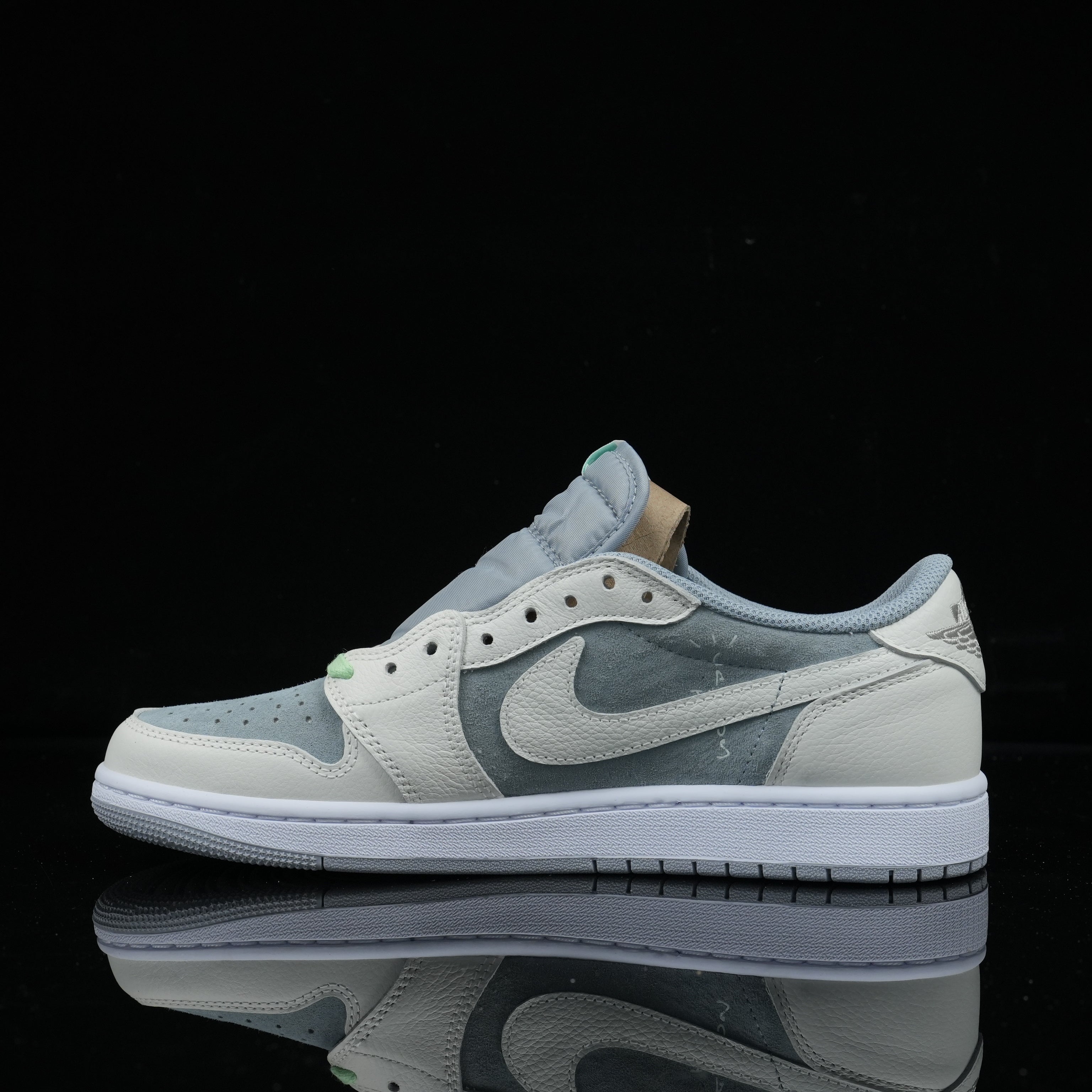 Travis Scott x Air Jordan 1 Low UNC Blue