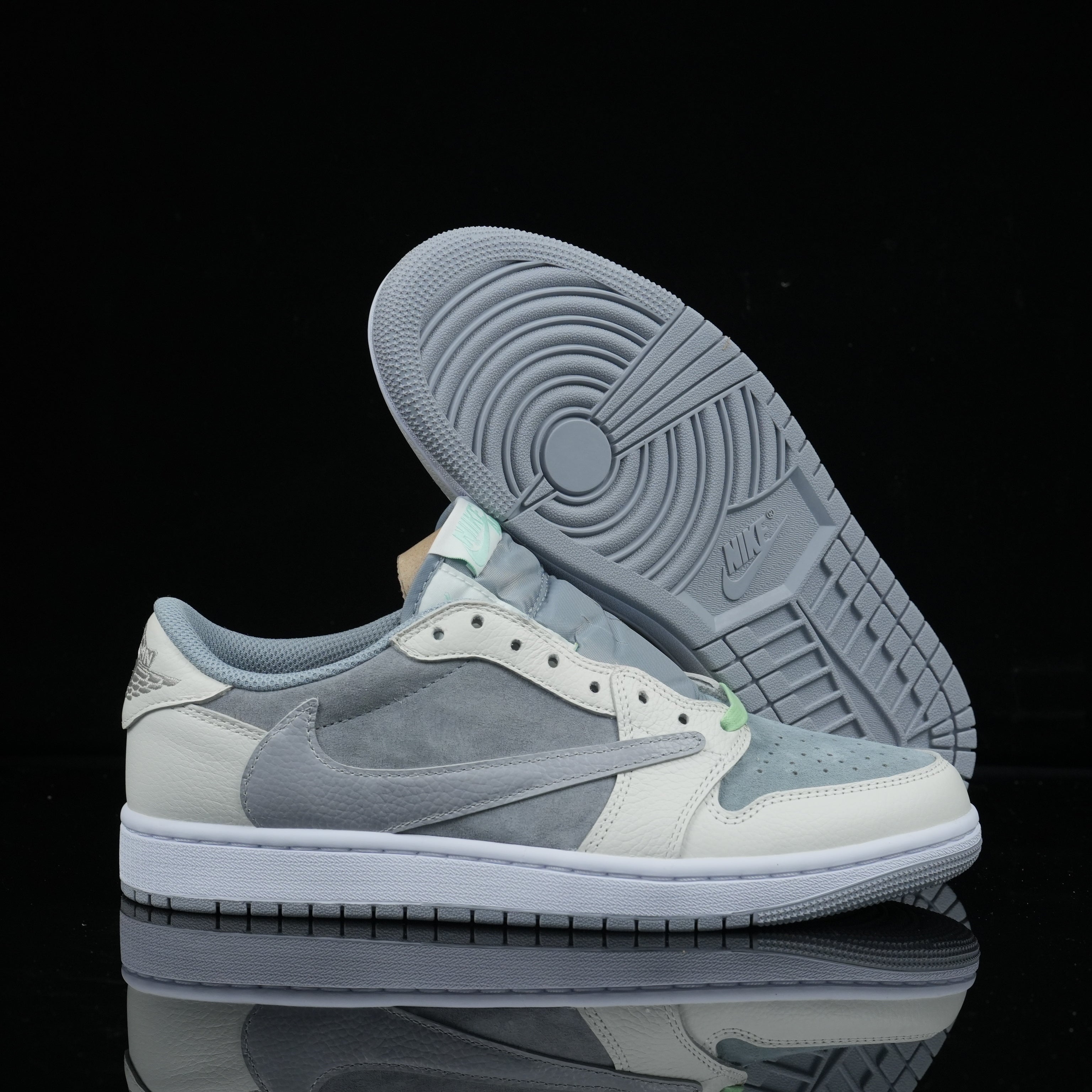 Travis Scott x Air Jordan 1 Low UNC Blue