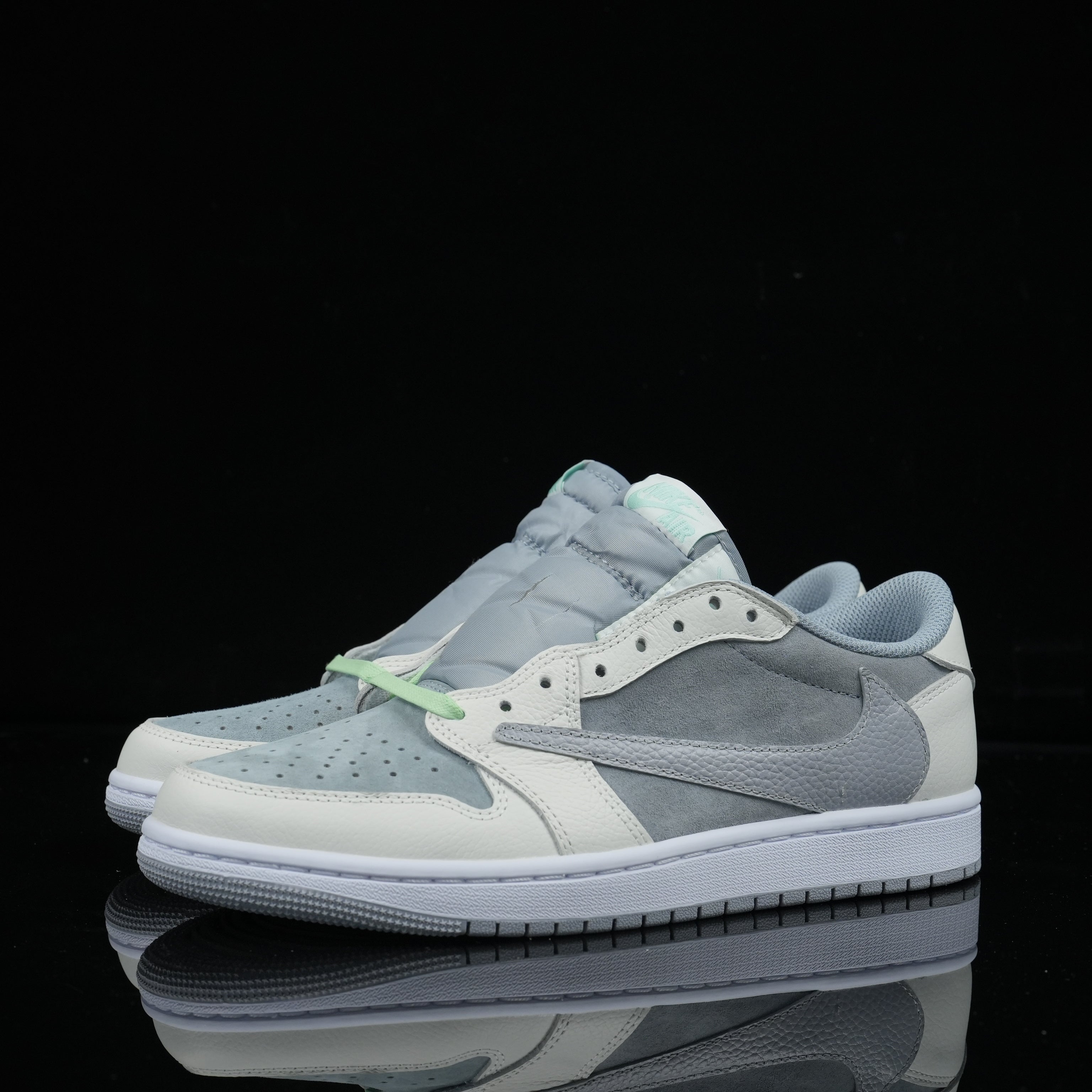 Travis Scott x Air Jordan 1 Low UNC Blue