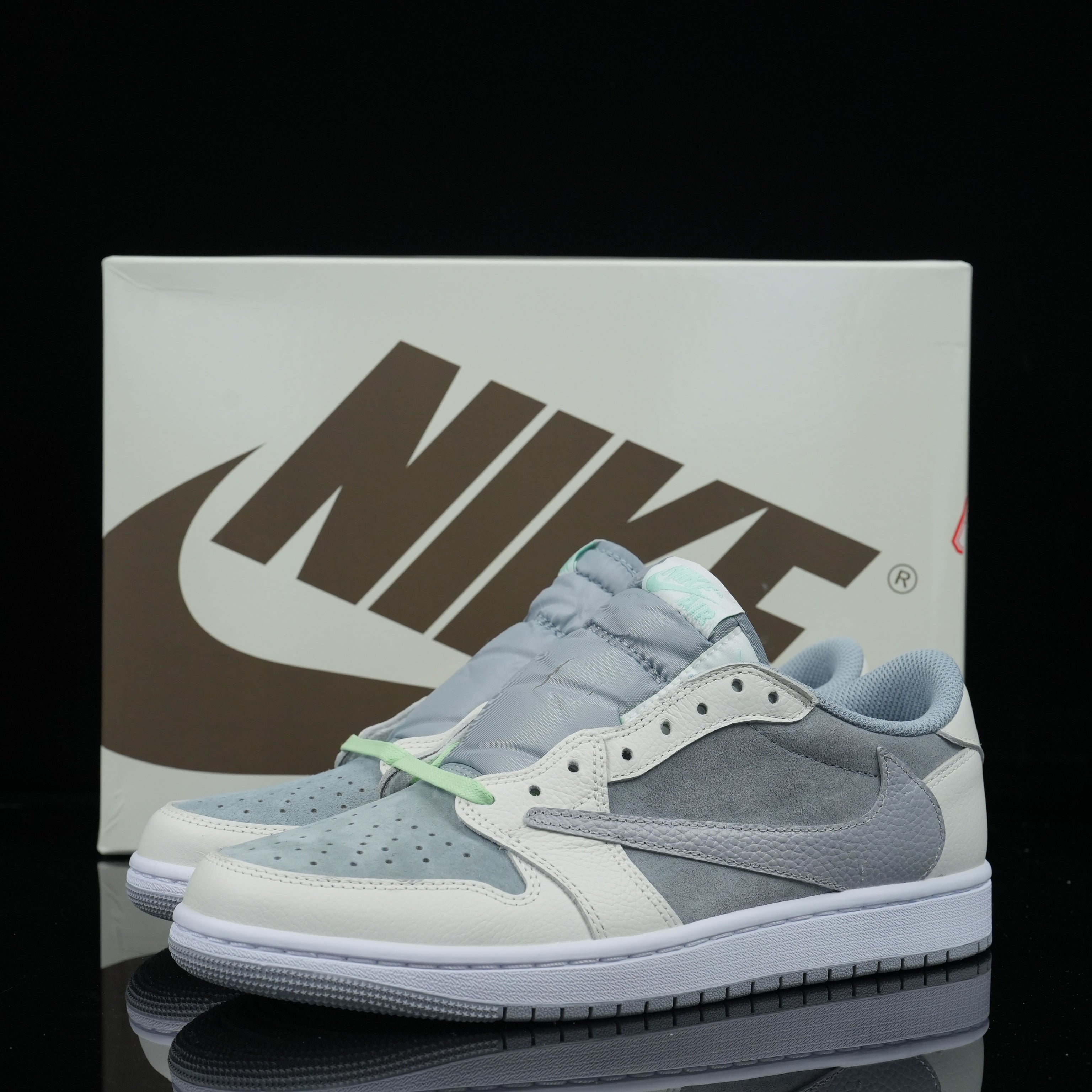 Travis Scott x Air Jordan 1 Low UNC Blue